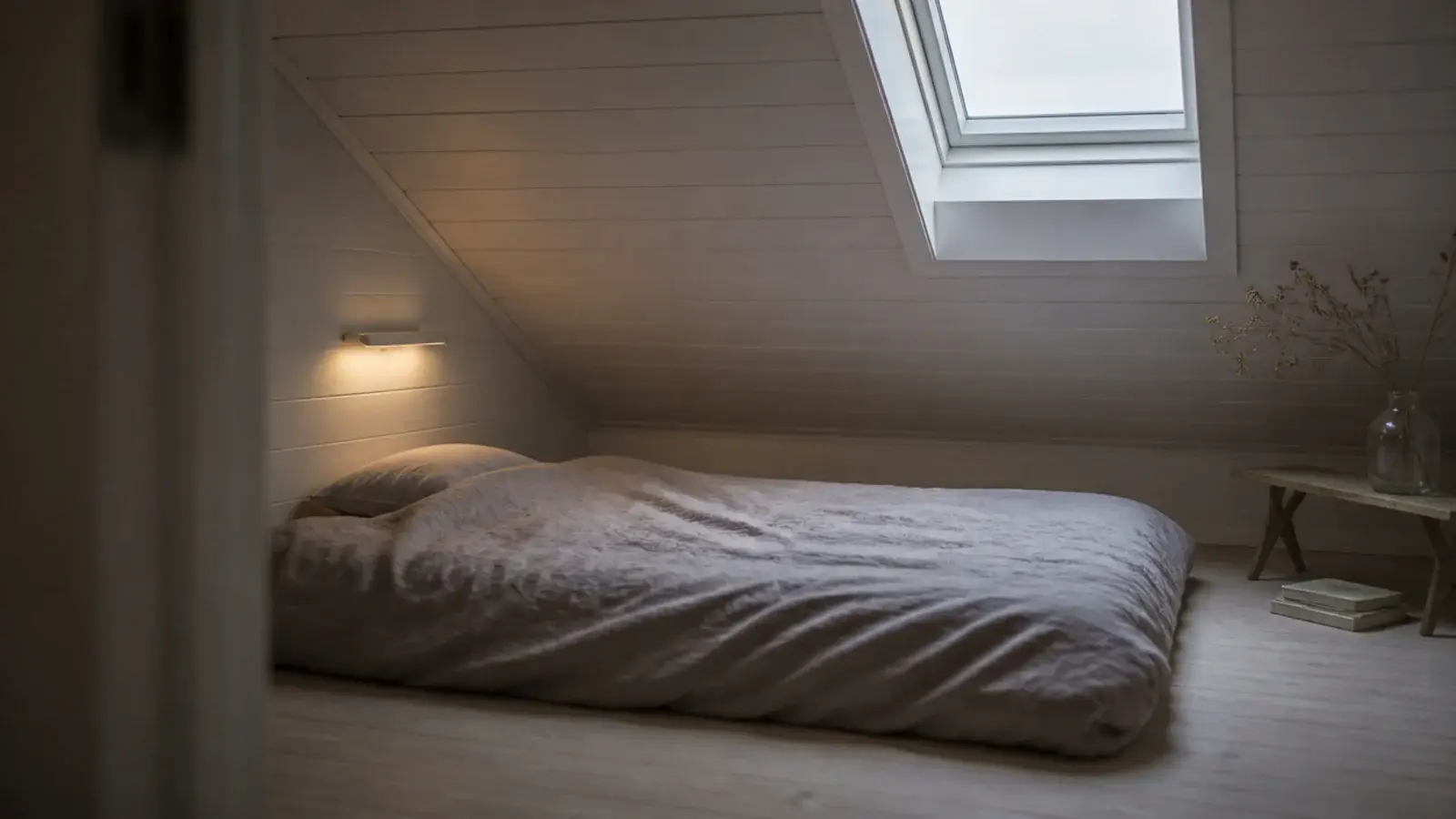attic bedroom ideas low ceiling room with a low bed under a short slope