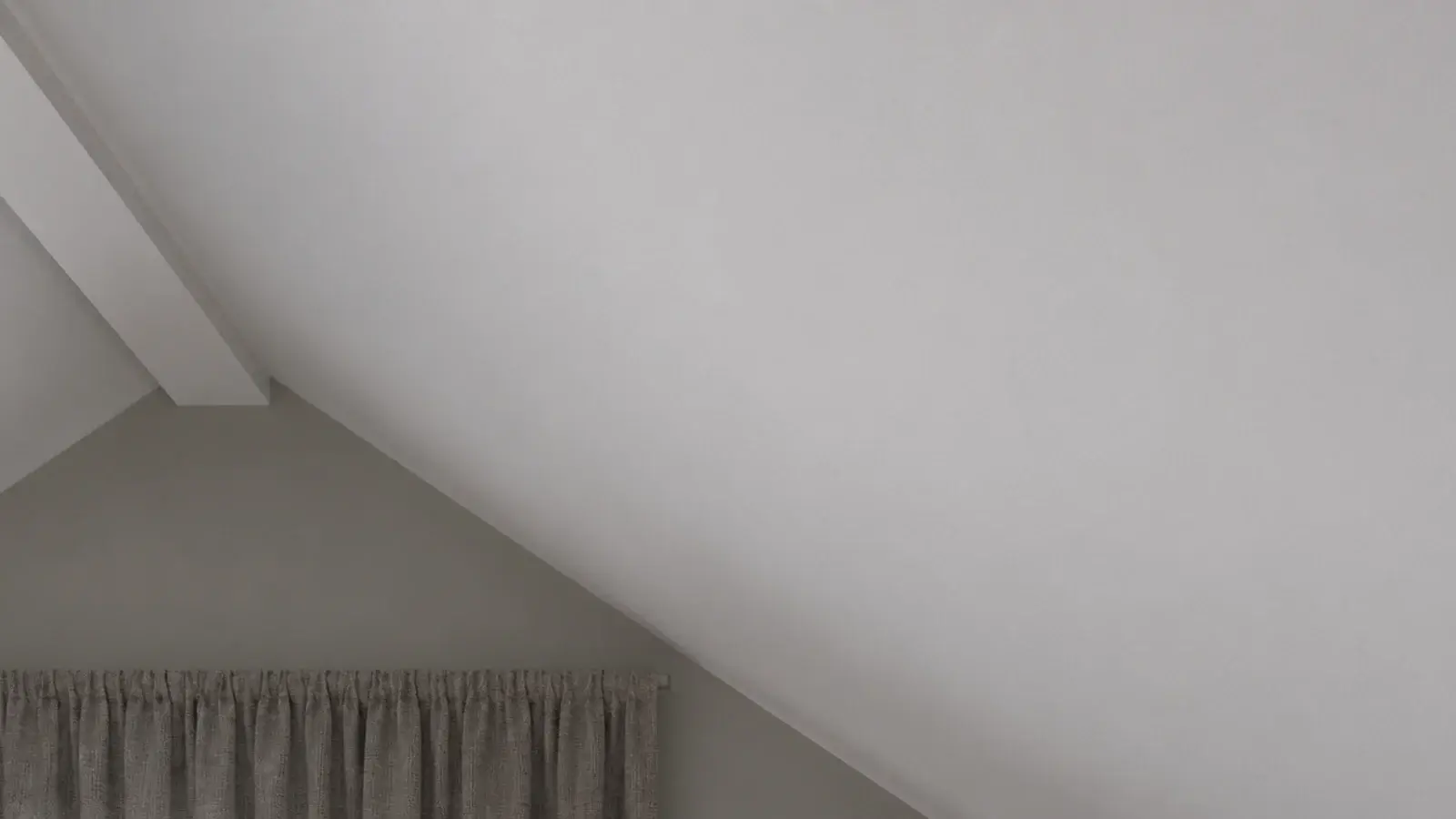 matte painted sloping ceiling showing no reflections under raking light