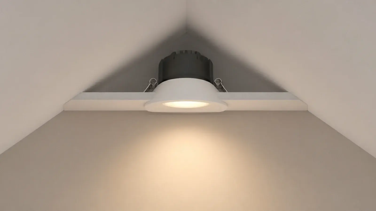angled trim downlight installed in a pitched attic bedroom ceiling
