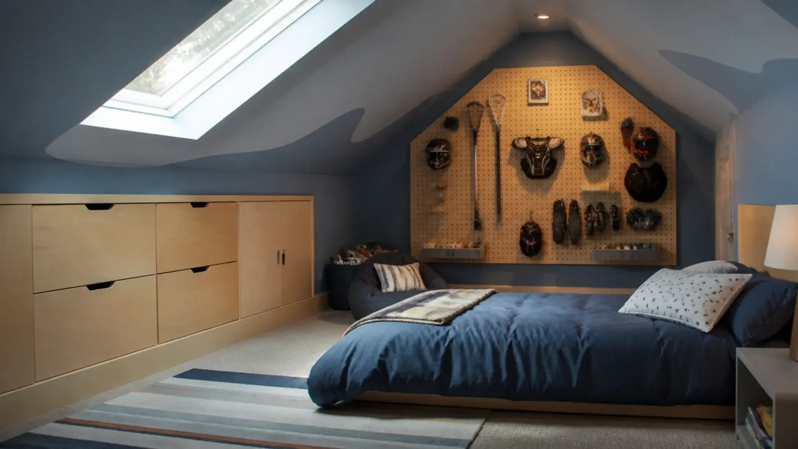 boys attic bedroom ideas with plywood storage a low bed and painted slopes