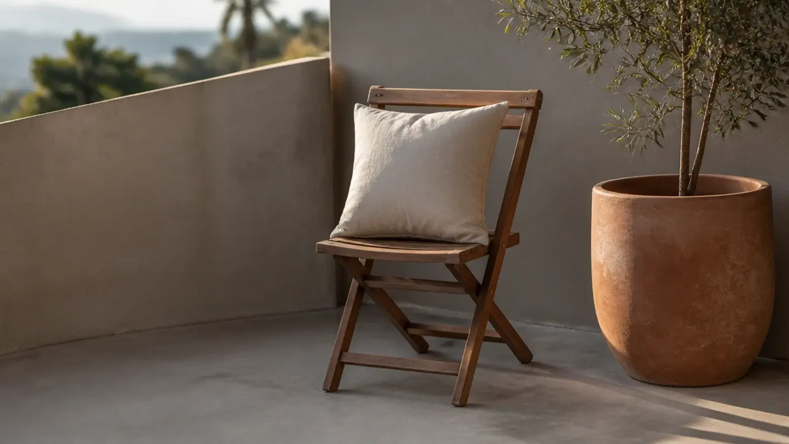 restrained balcony corner with limited materials and clear empty floor