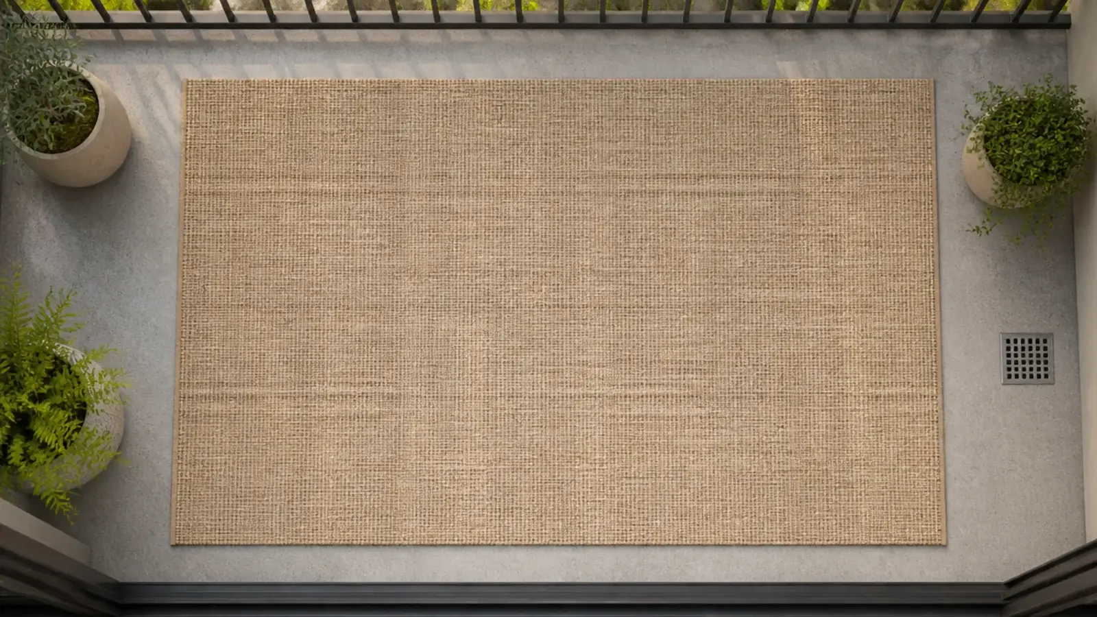 open weave rug covering most of a balcony floor with neat margins