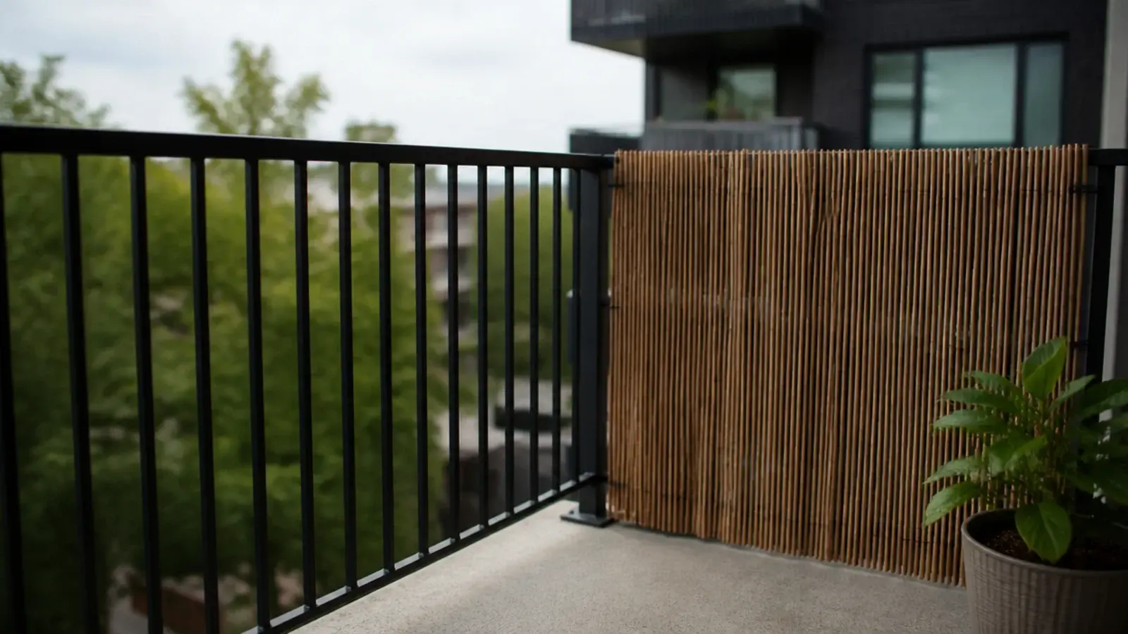 natural reed fencing screening one corner inside a balcony railing
