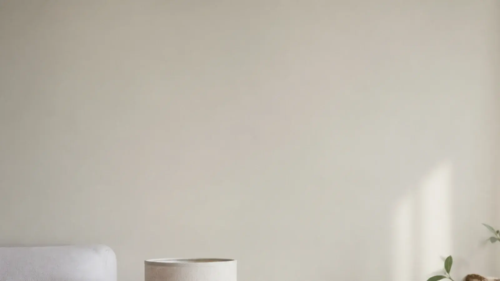 tall view of an organized bedside table with zoned drawer and clear top