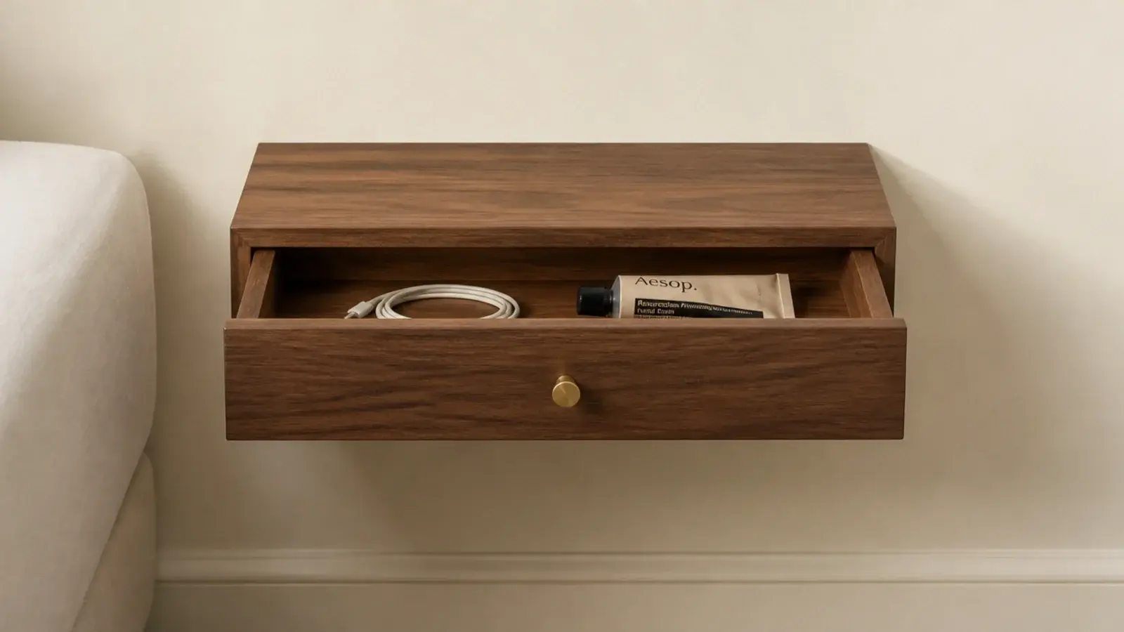 wall mounted timber box with a single drawer slightly pulled open