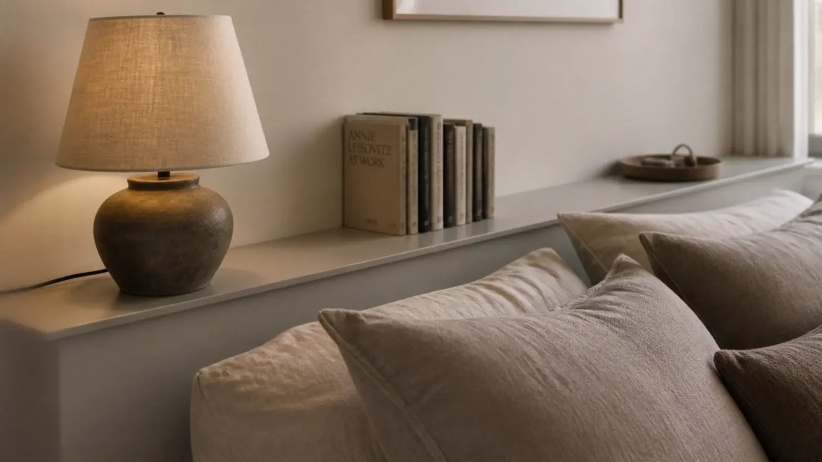long shallow console running the entire length of a bed side