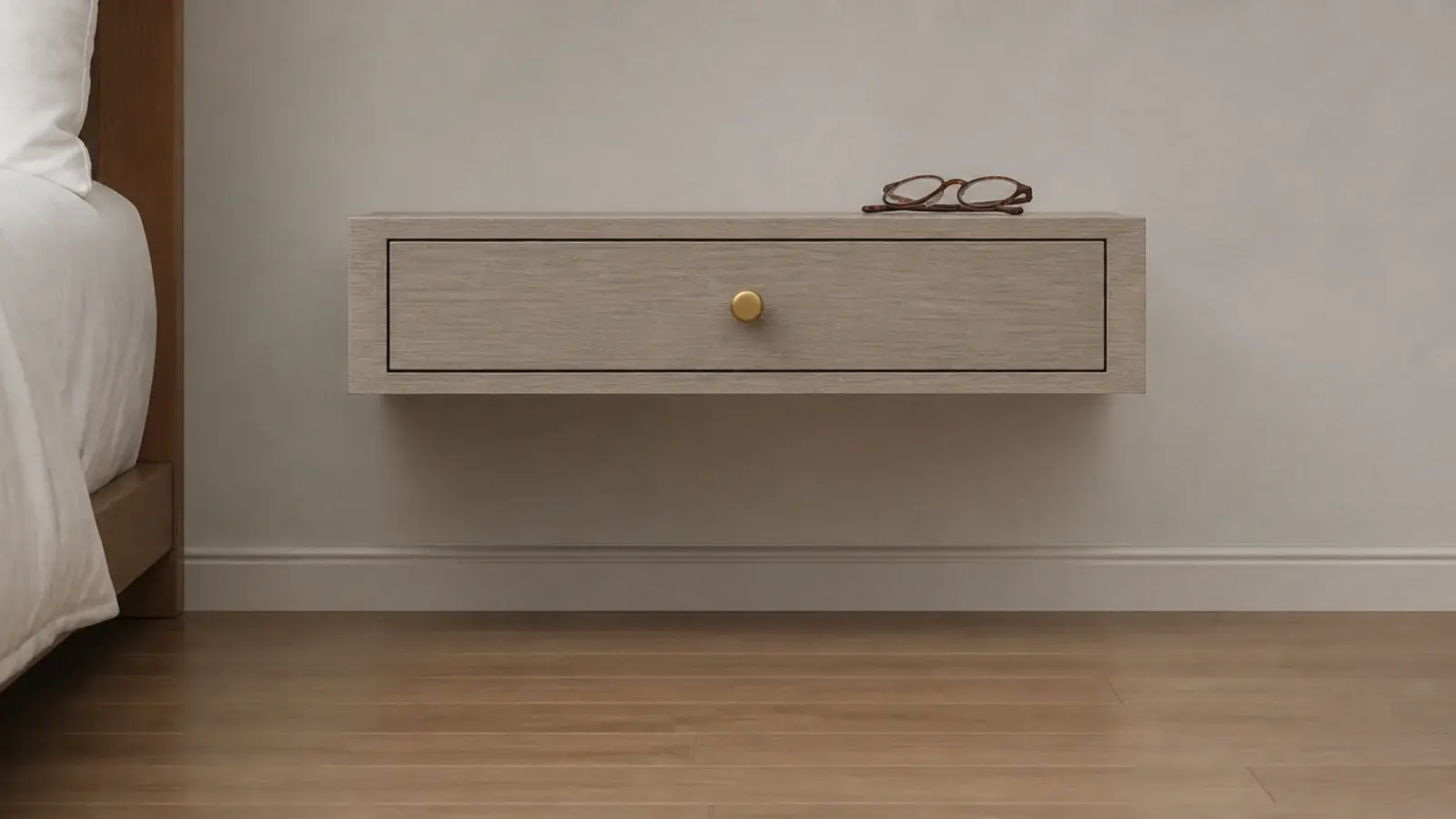 shallow drawer box mounted to the wall with no legs beneath