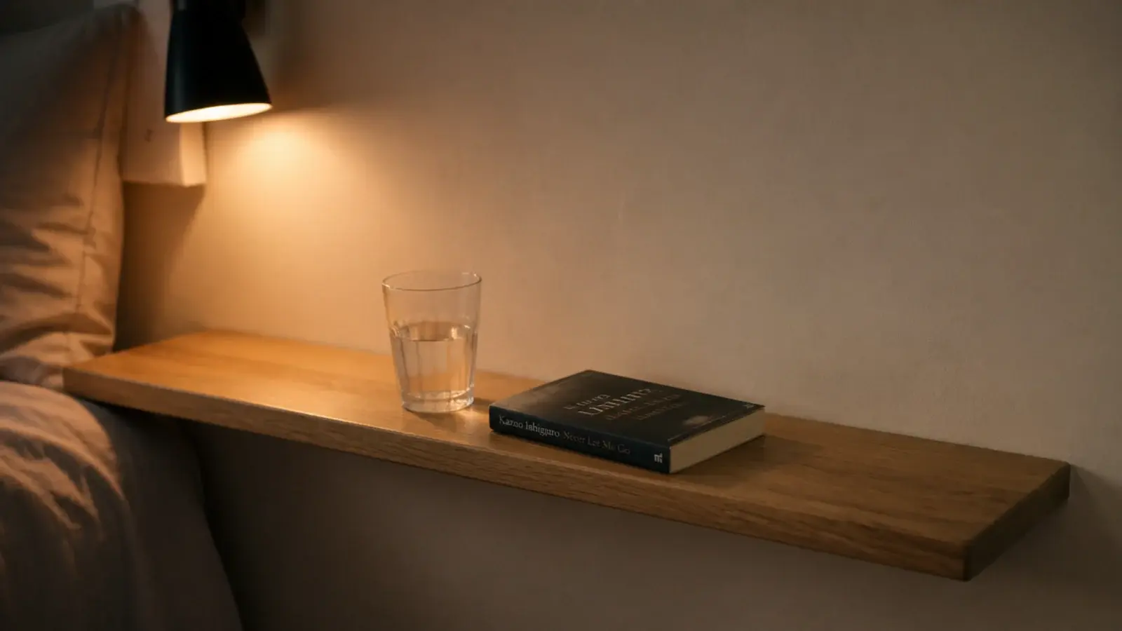 tidy small bedside surface holding only two objects and clear space
