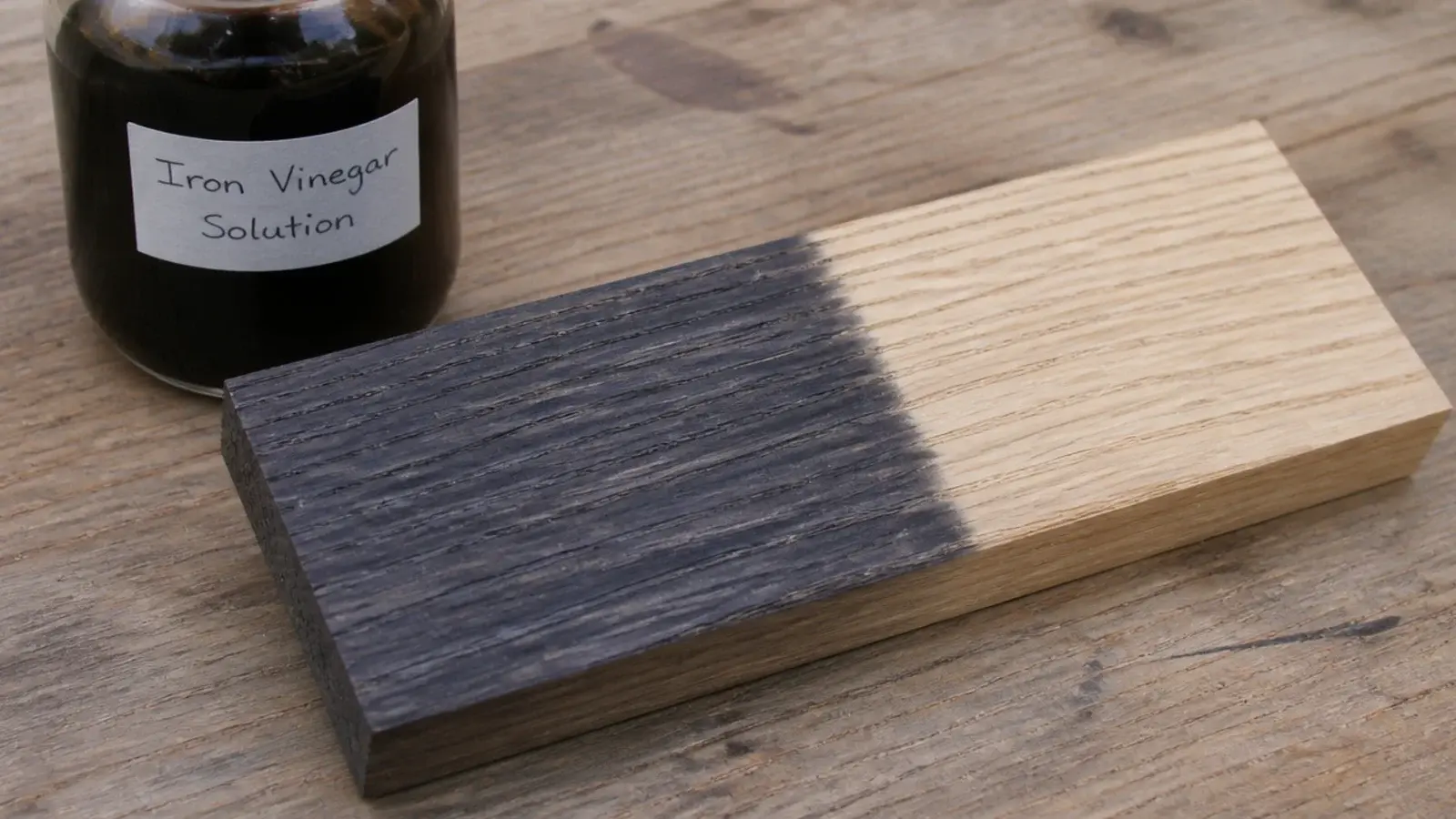 oak sample turning deep grey black after an iron vinegar treatment