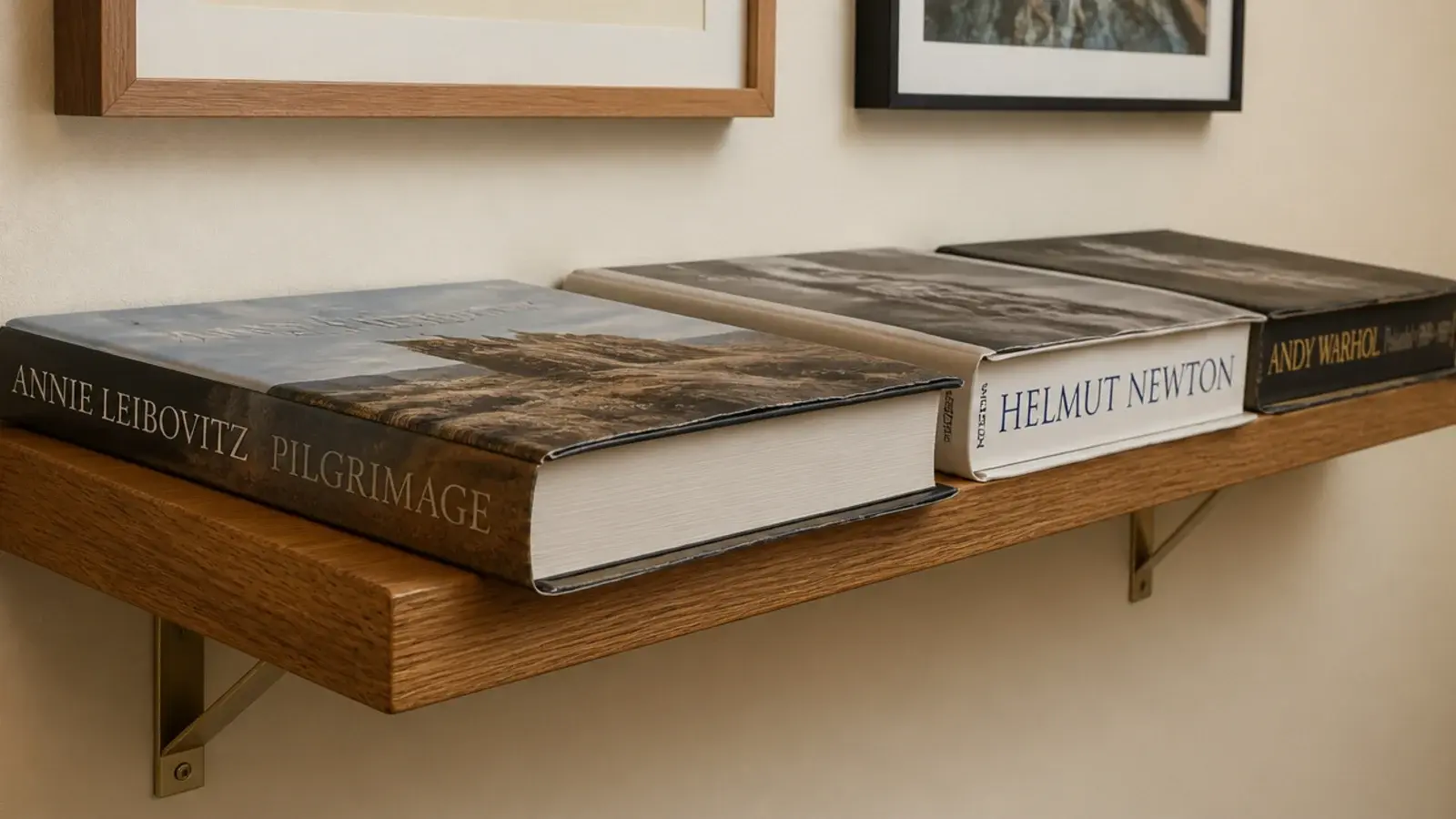 hardback books overhanging the front edge of shallow eight inch shelving