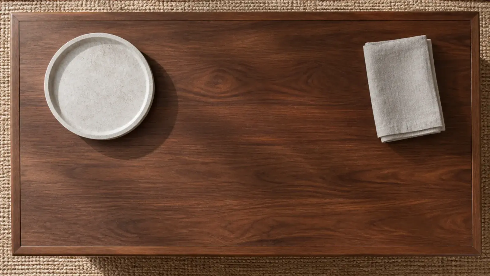 bare walnut coffee table with a single empty tray ready for candle styling