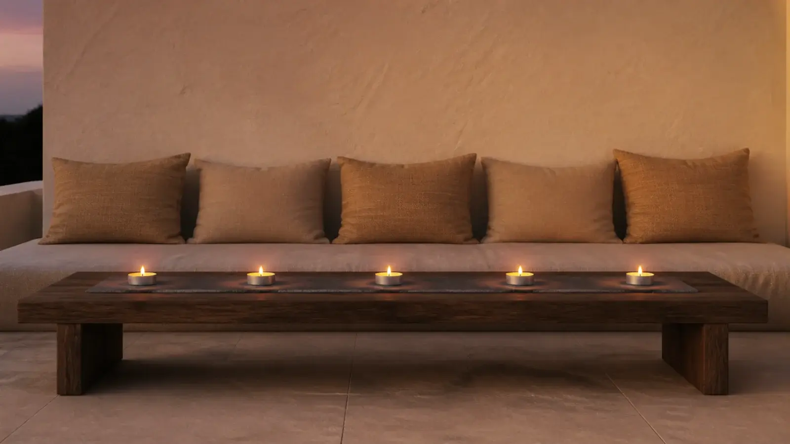 row of spaced tealights running along a long rectangular coffee table