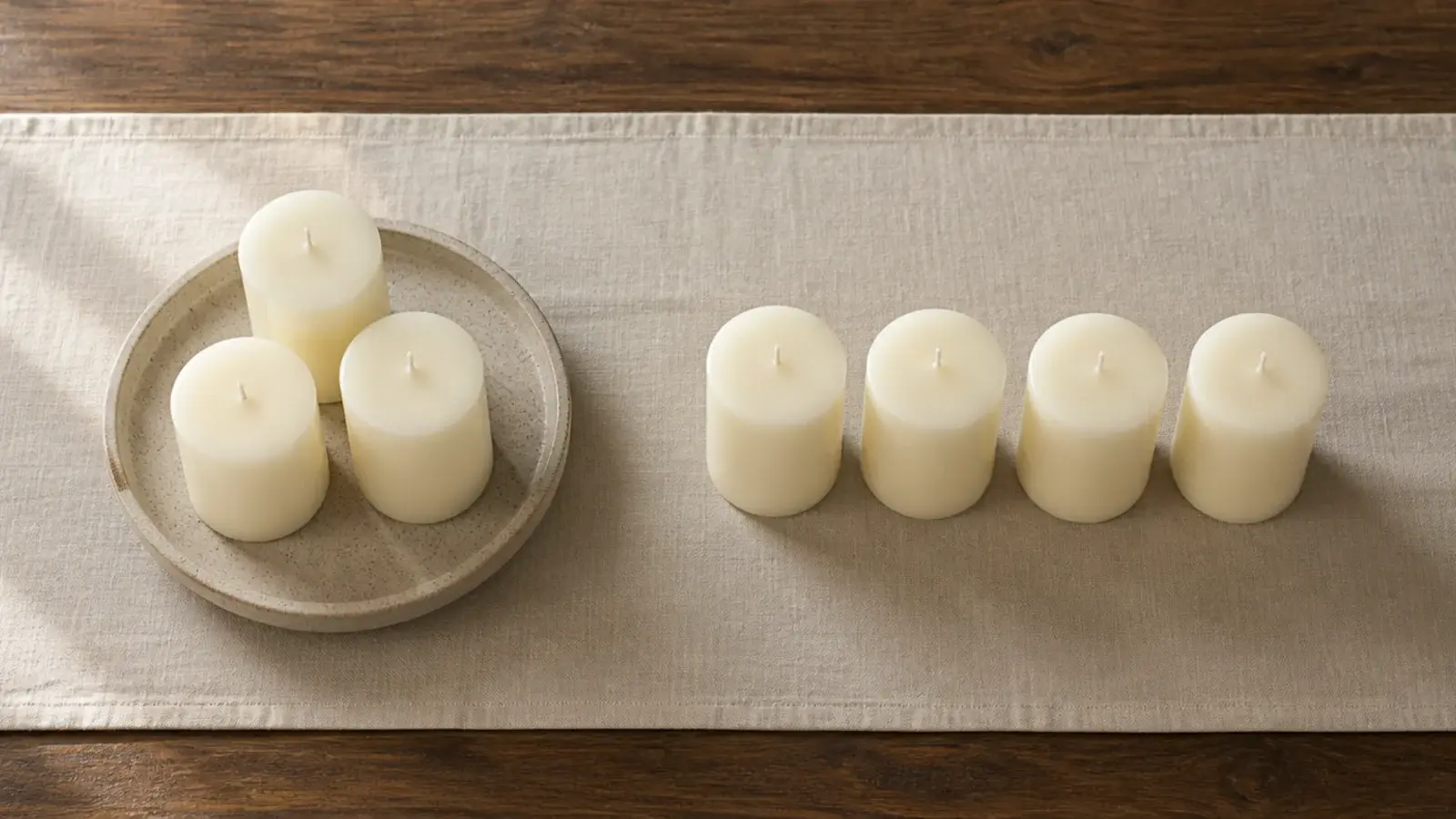 three candles grouped beside four candles showing why odd numbers work