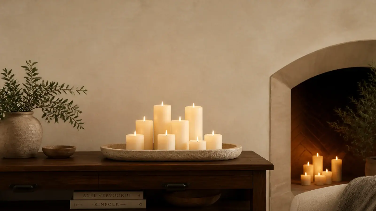 vertical view of pillar candle groupings on trays mantels and hearths