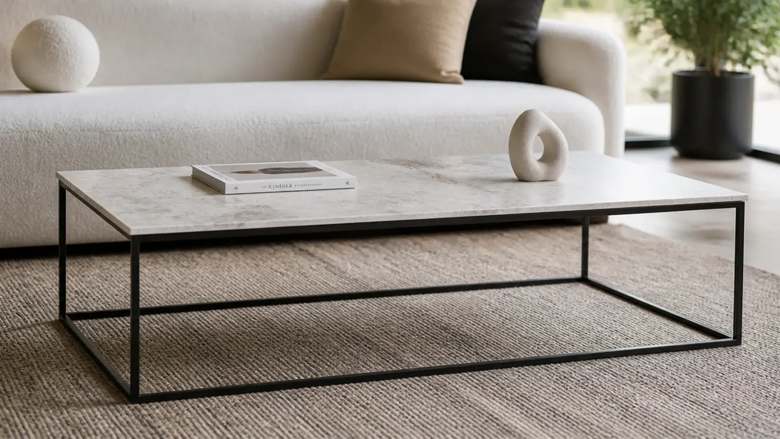 modern center table in a living room with sintered stone and steel
