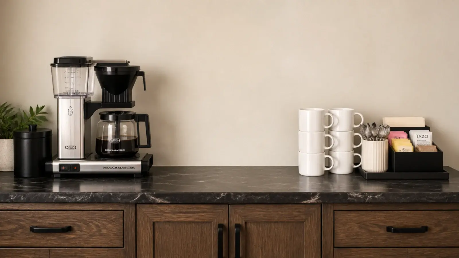 coffee station divided into brewing and serving zones on a counter