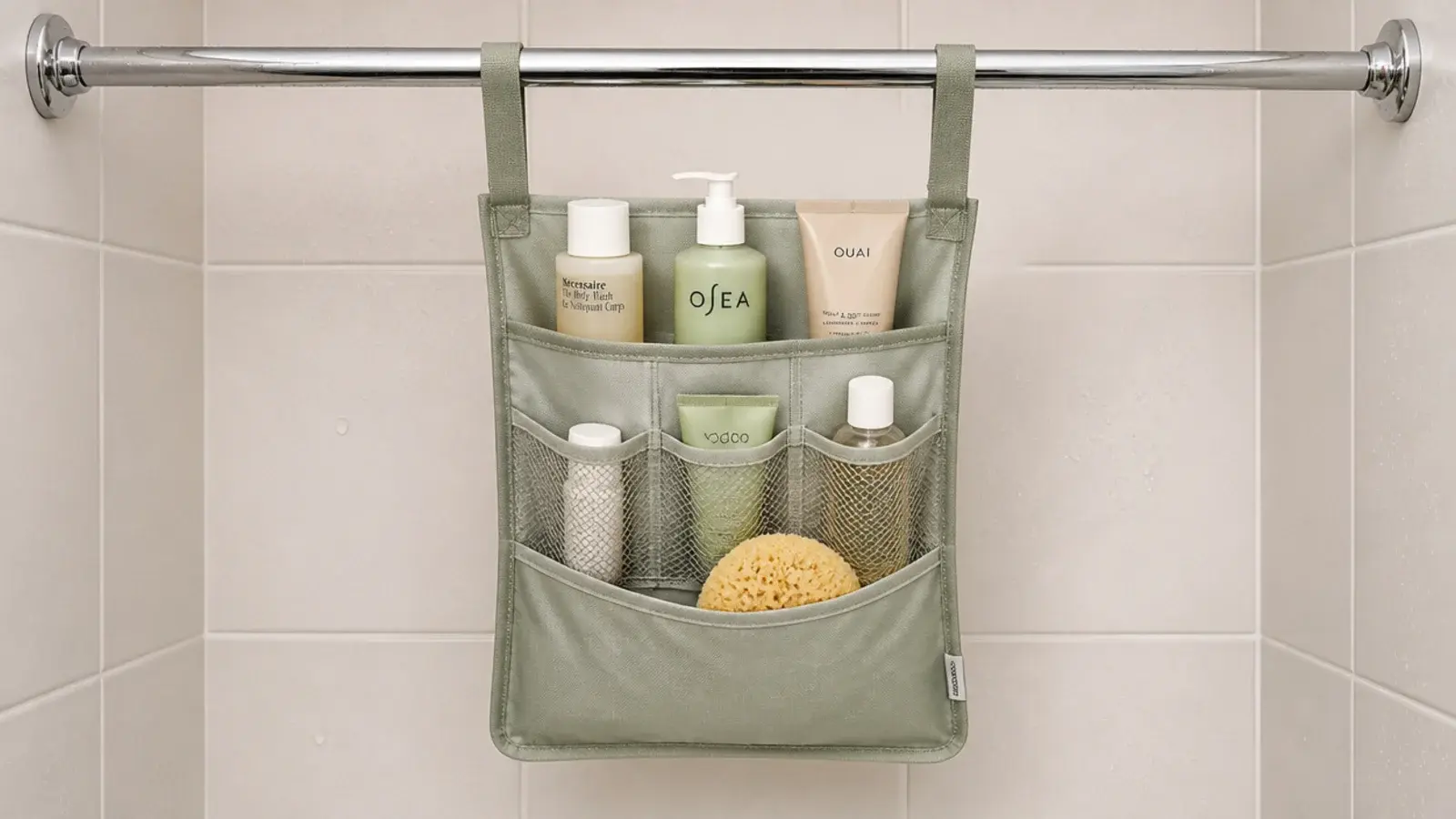 hanging caddy suspended from a shower rod in a tiled corner