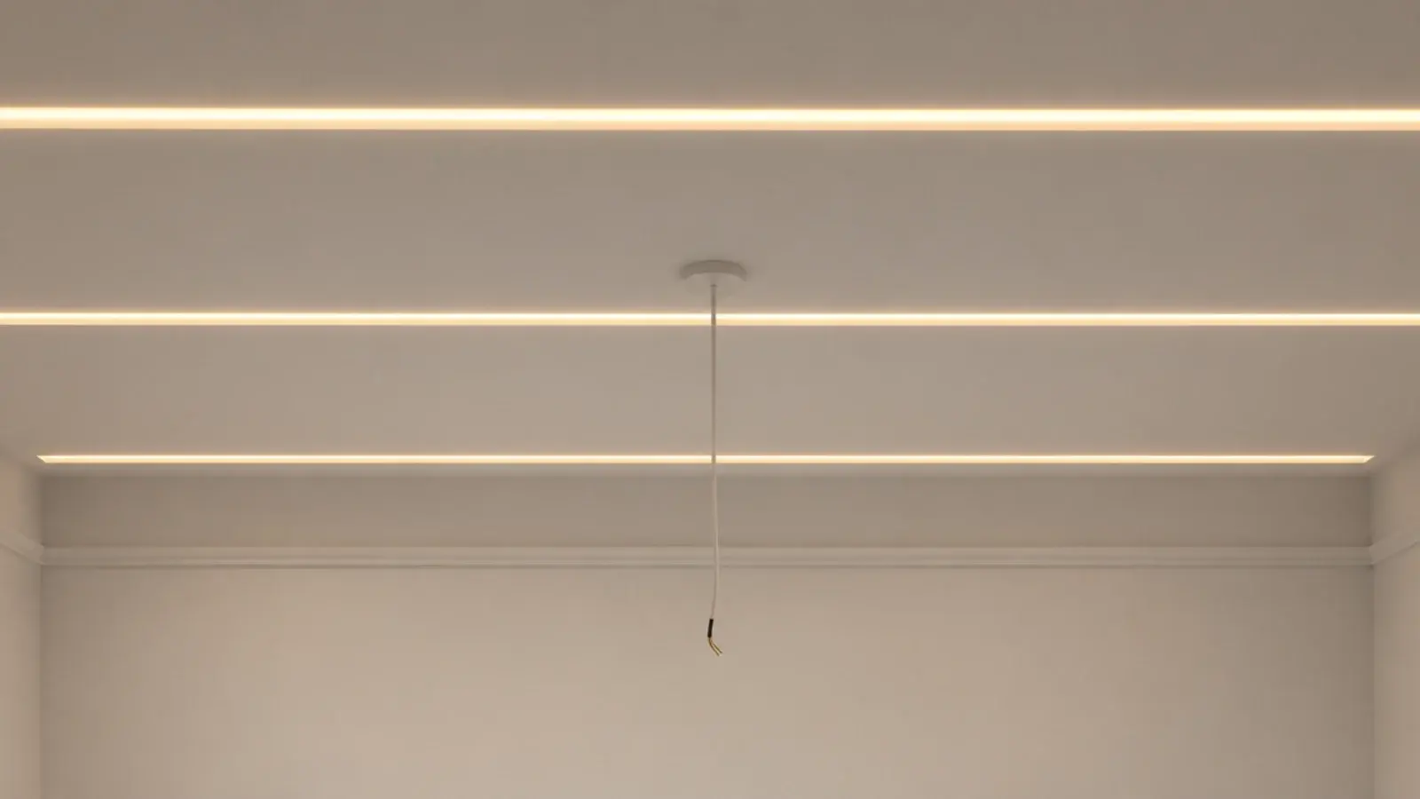 three evenly spaced warm light runs crossing a plain white ceiling