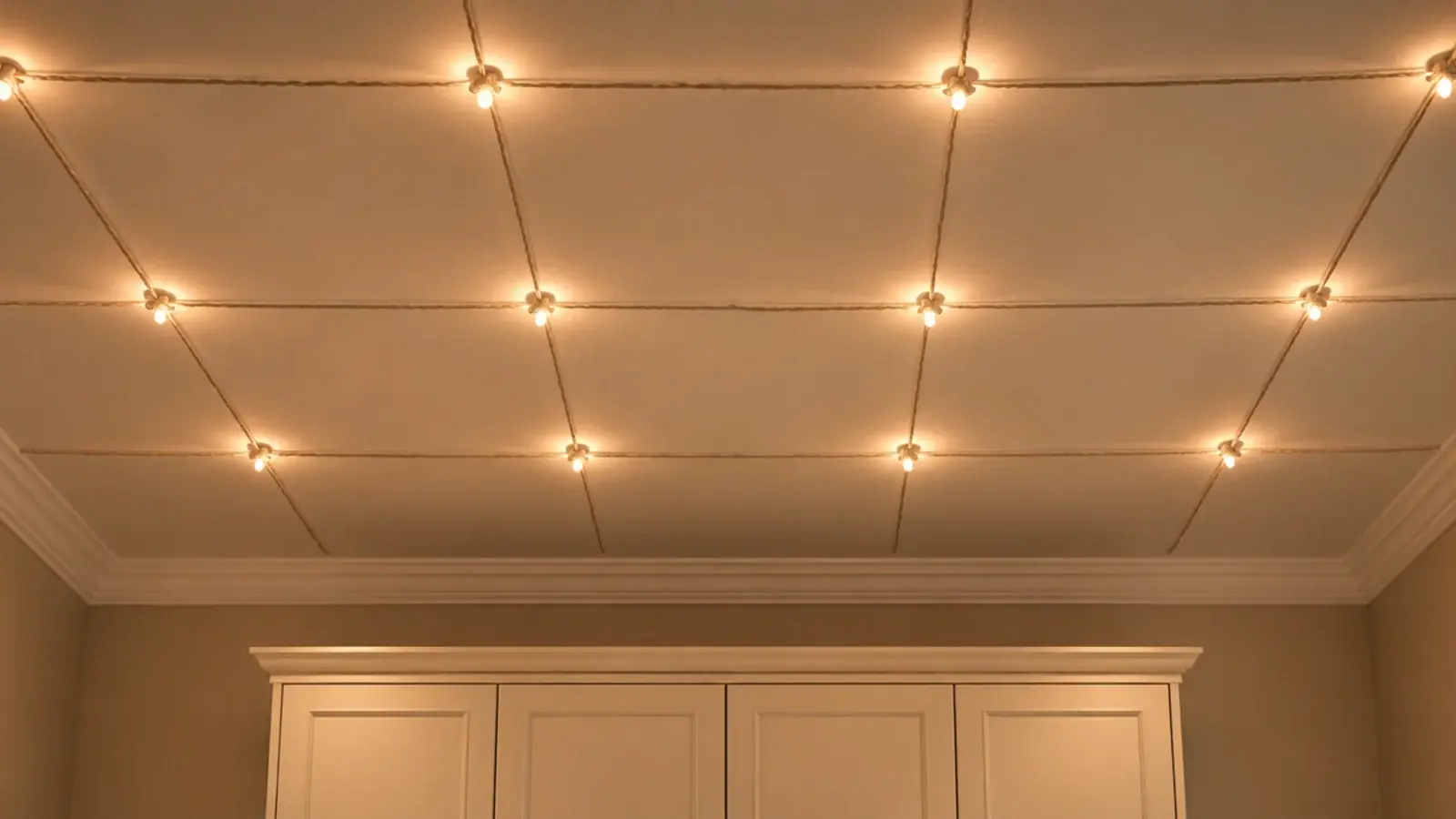 crossing light strands forming a wide grid on a ceiling