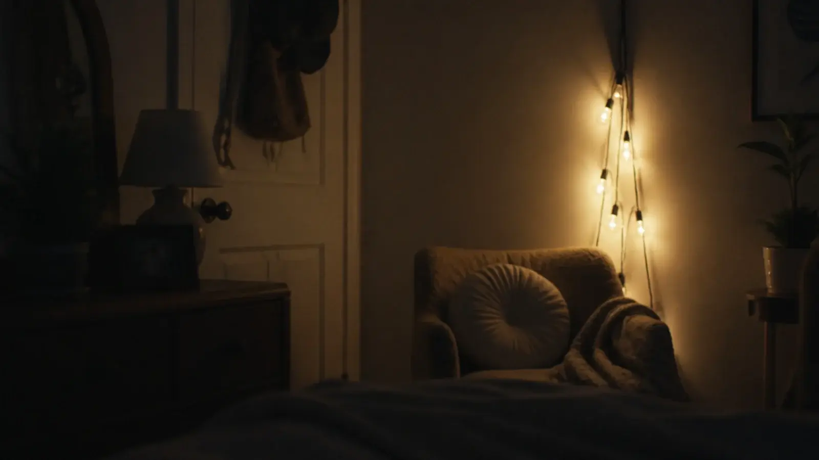 three light strands bunched together brightening a single room corner