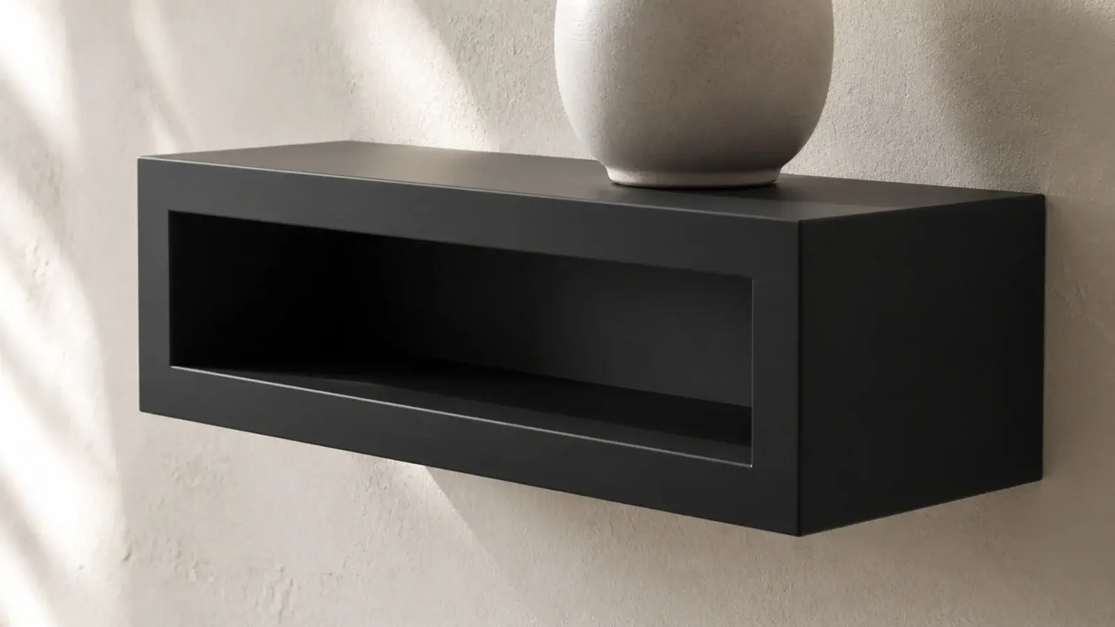 thick black box shelf showing a deep two inch front edge