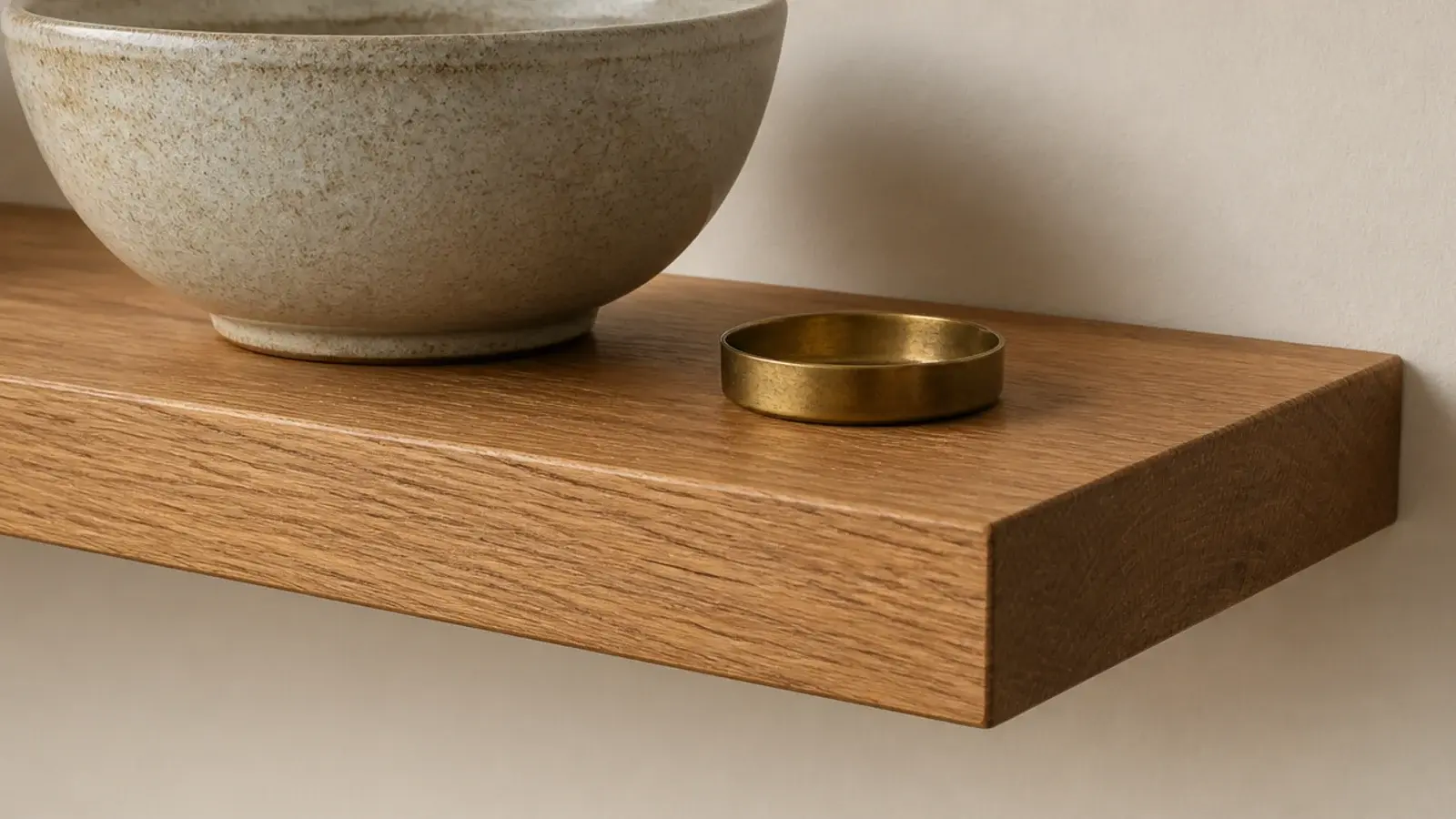 thick built up floating shelf with a two inch front edge in oak
