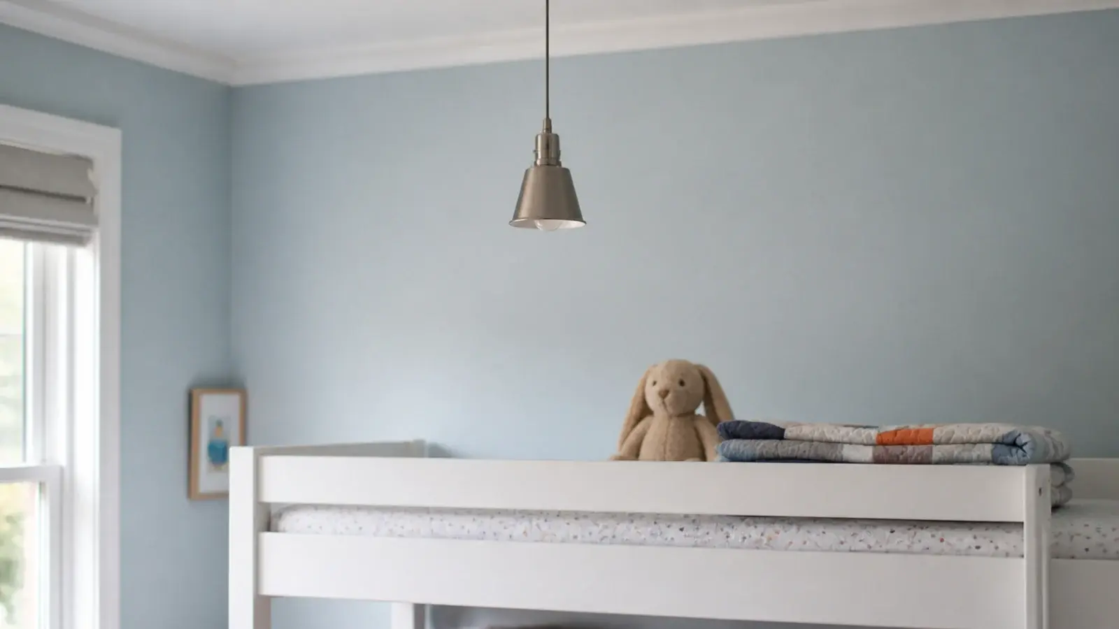 pendant hung well clear above the top bunk of a bed