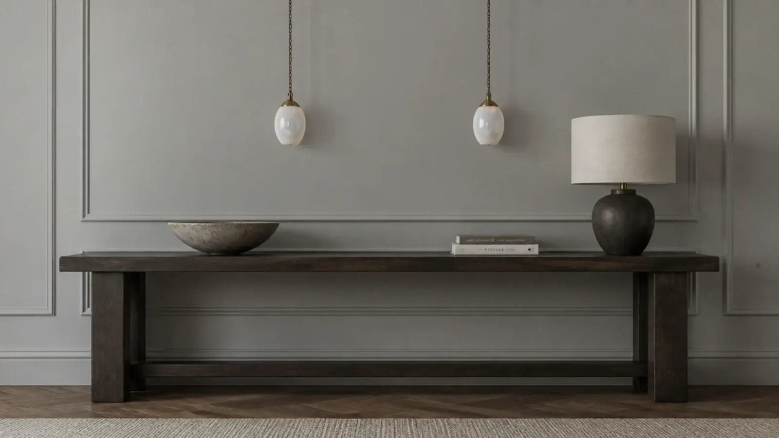 pair of small pendants spaced above a long living room console