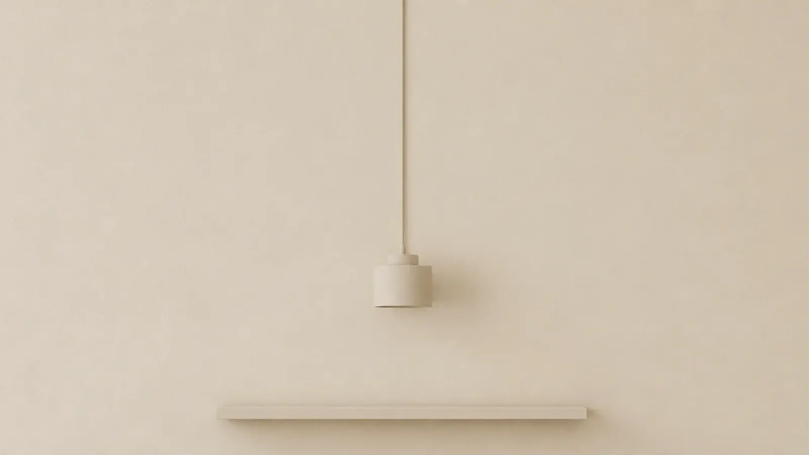 pale fabric cord blending into the wall it runs beside