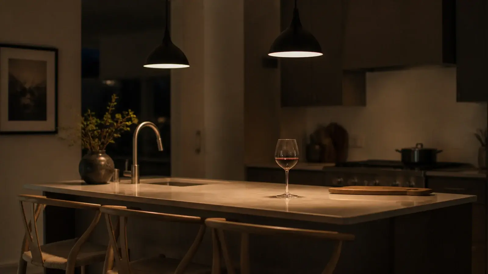 kitchen with only the pendants lit and downlights switched off