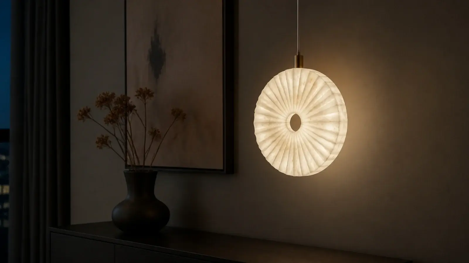 fluted alabaster disc pendant glowing with visible stone veining