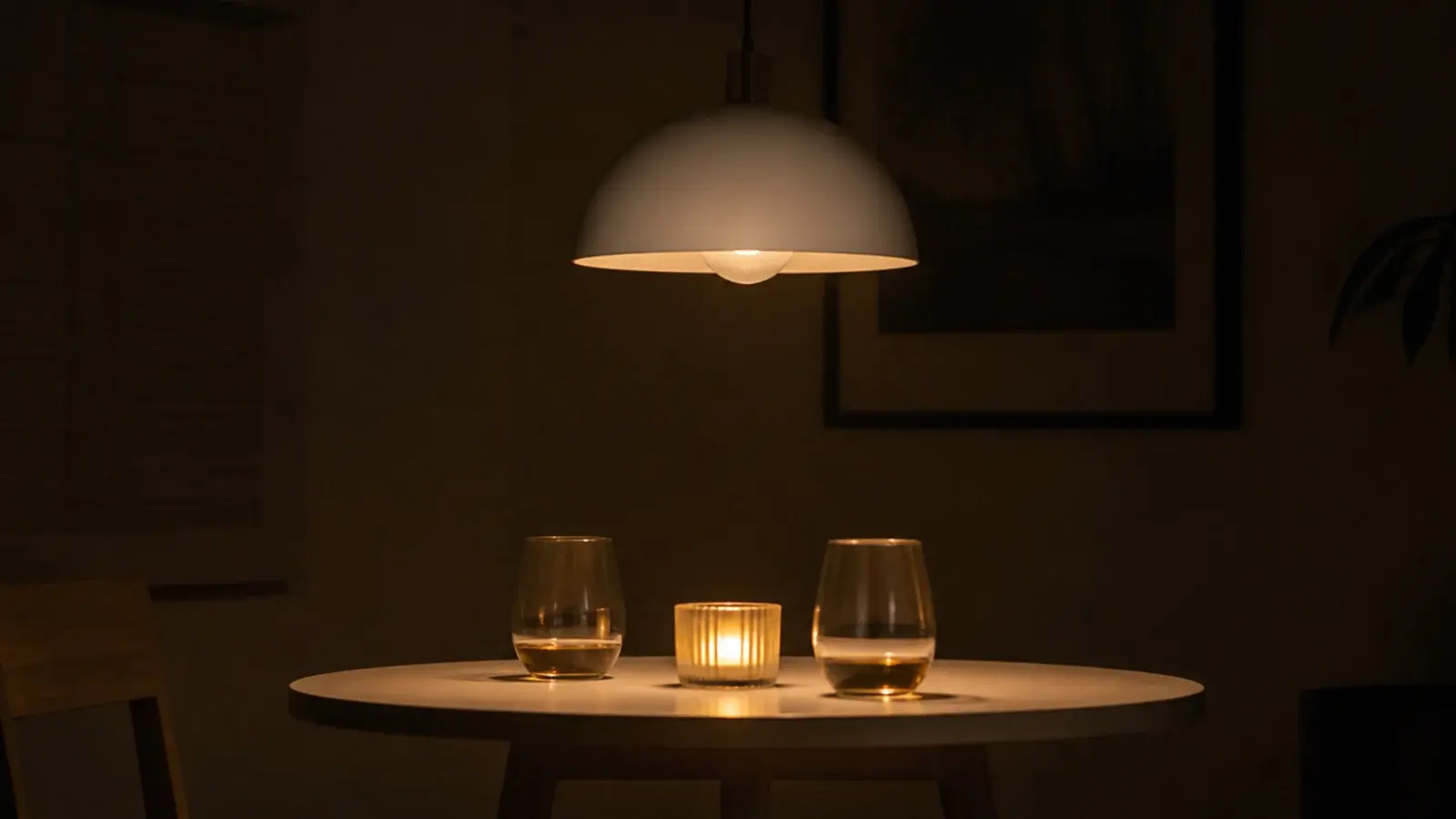 ordinary shade holding a smart bulb dimmed low in the evening