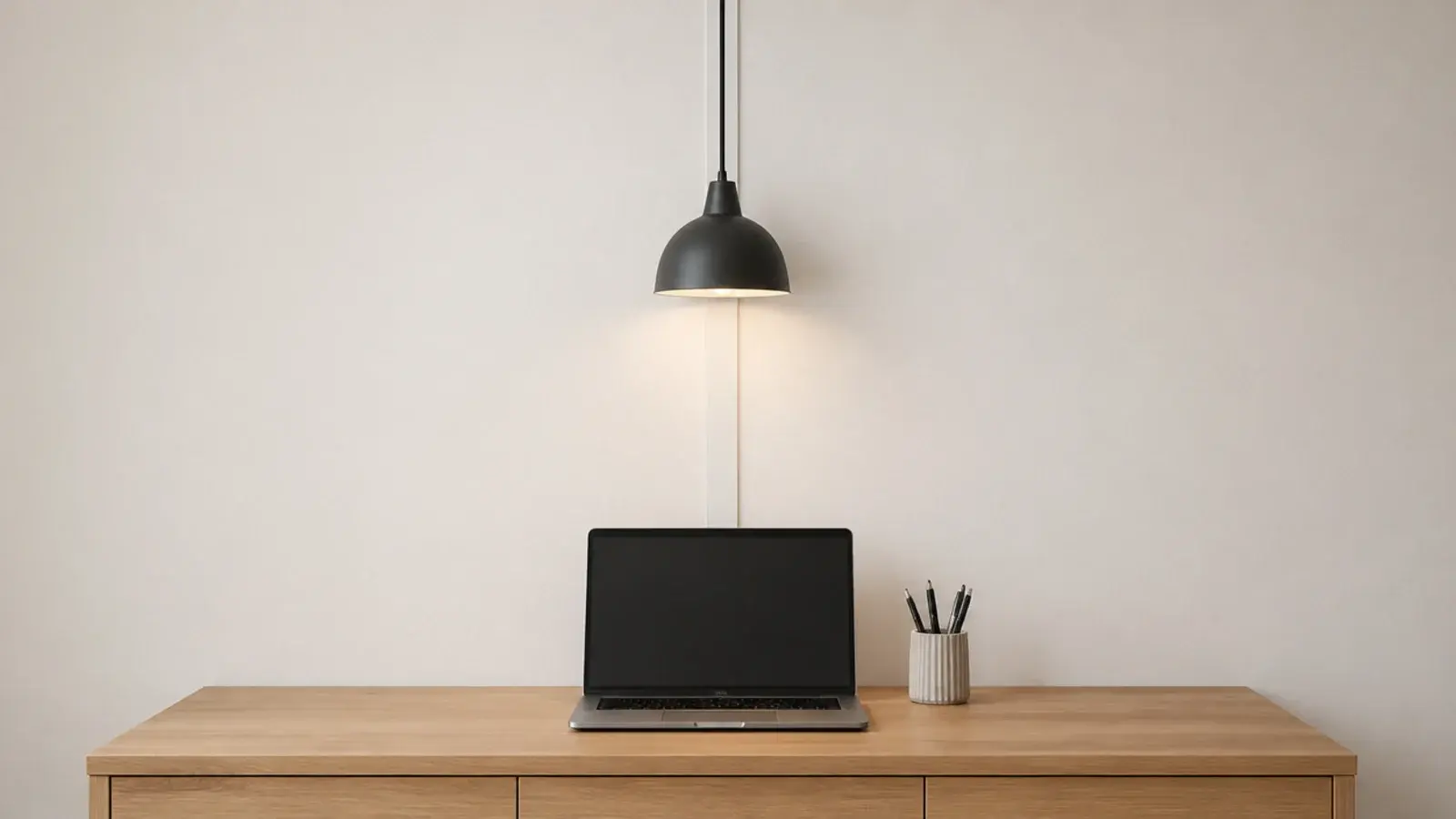 pendant cord running down a wall clear of a desk surface