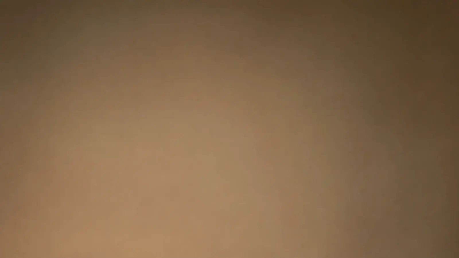 tall view of warm wall hanging lights in a rented room corner