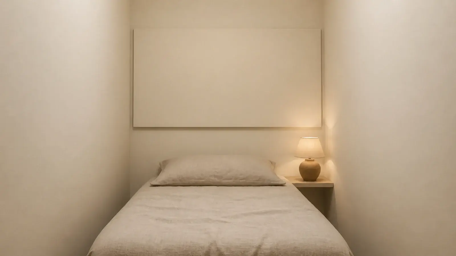 box room headboard painted the wall color to save visual space