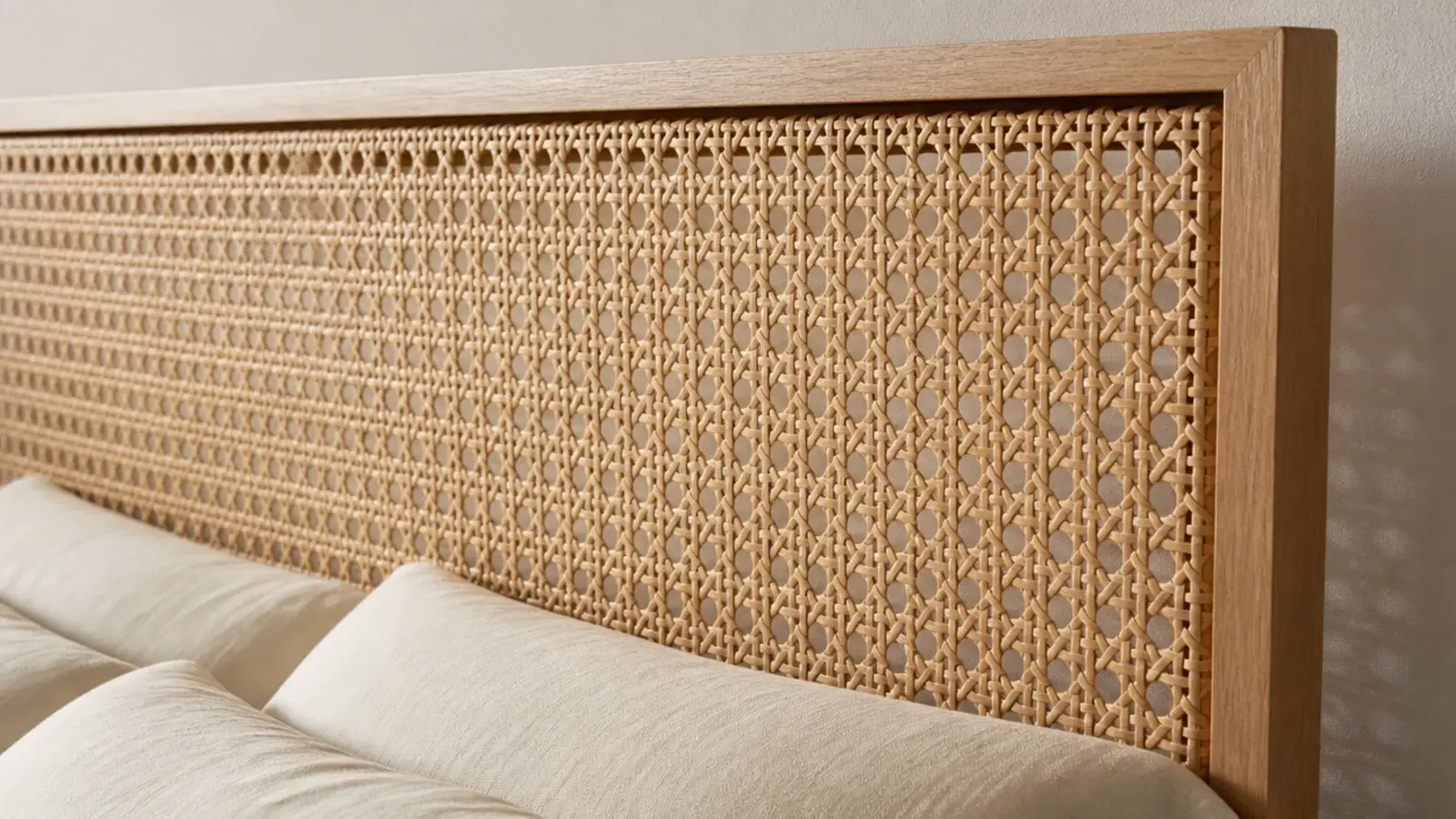 cane webbing panel set inside a minimal square edged oak headboard frame