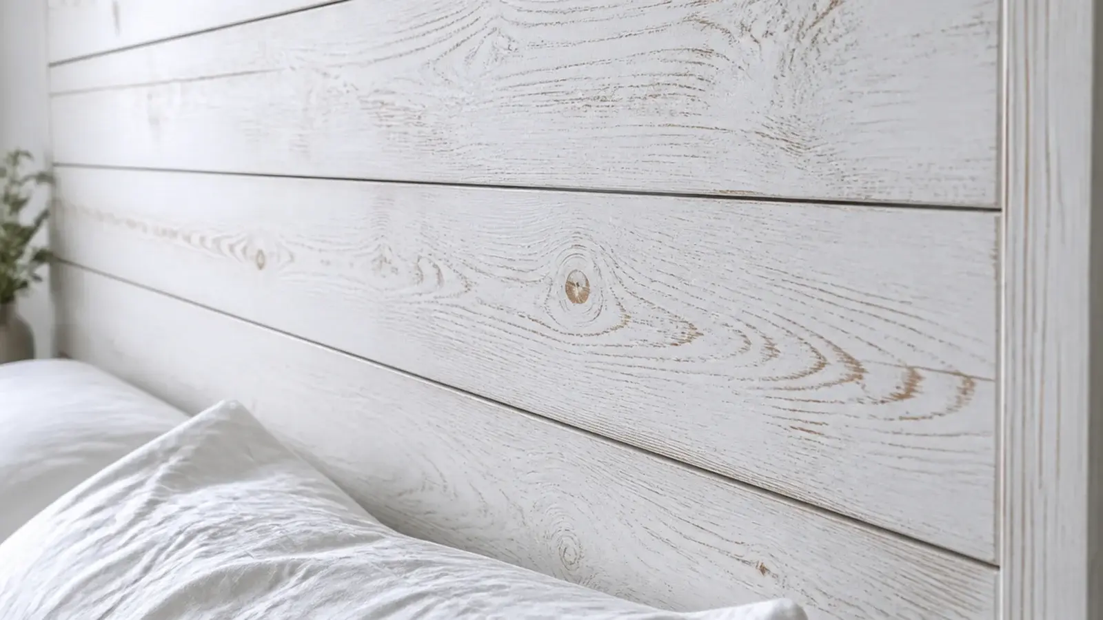 whitewashed shiplap headboard boards with fine shadow gaps and visible grain