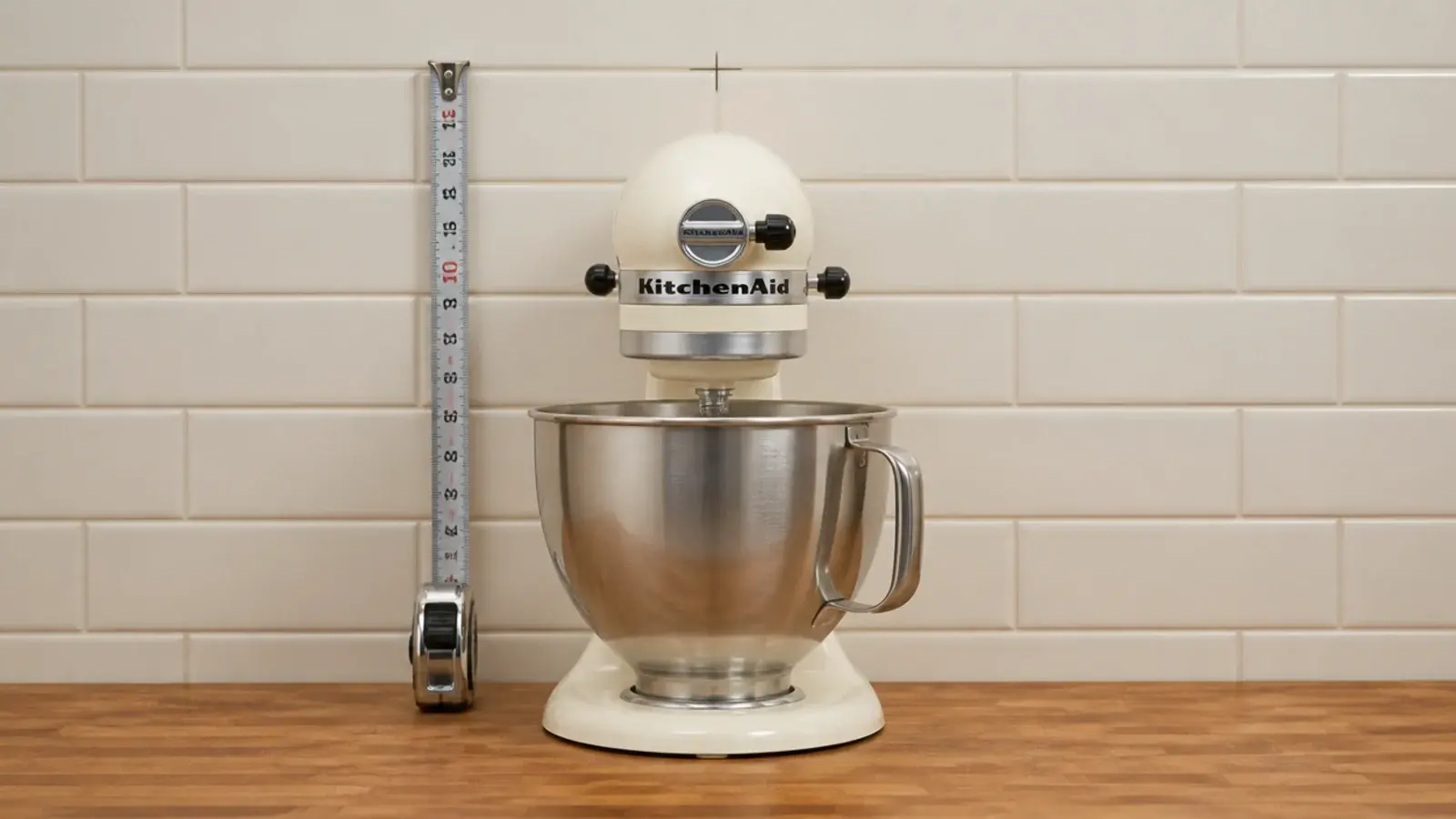 stand mixer measured against a kitchen wall to set diy shelf height