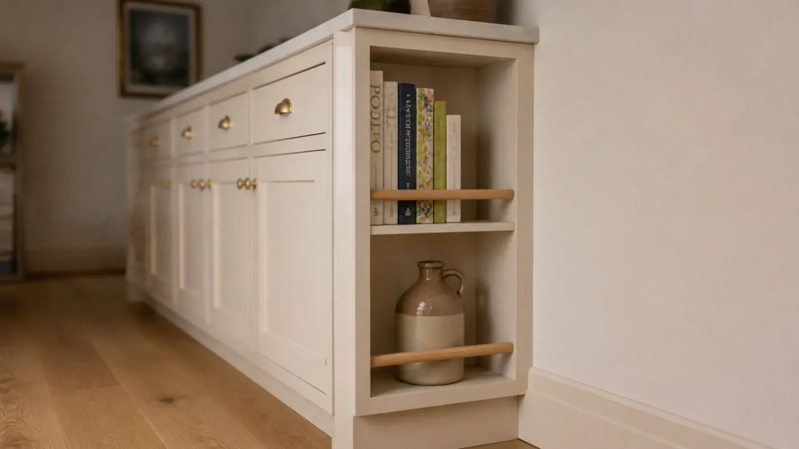narrow shelves added to a cabinet gable end in a tight kitchen