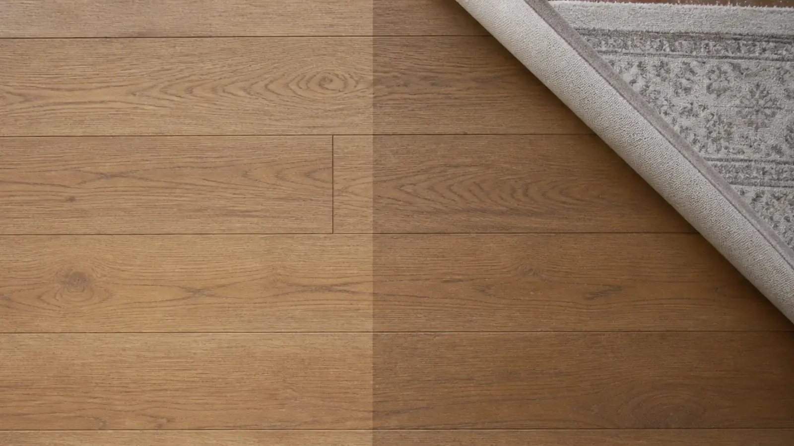 visible tone difference on oak boards where a rug edge once sat