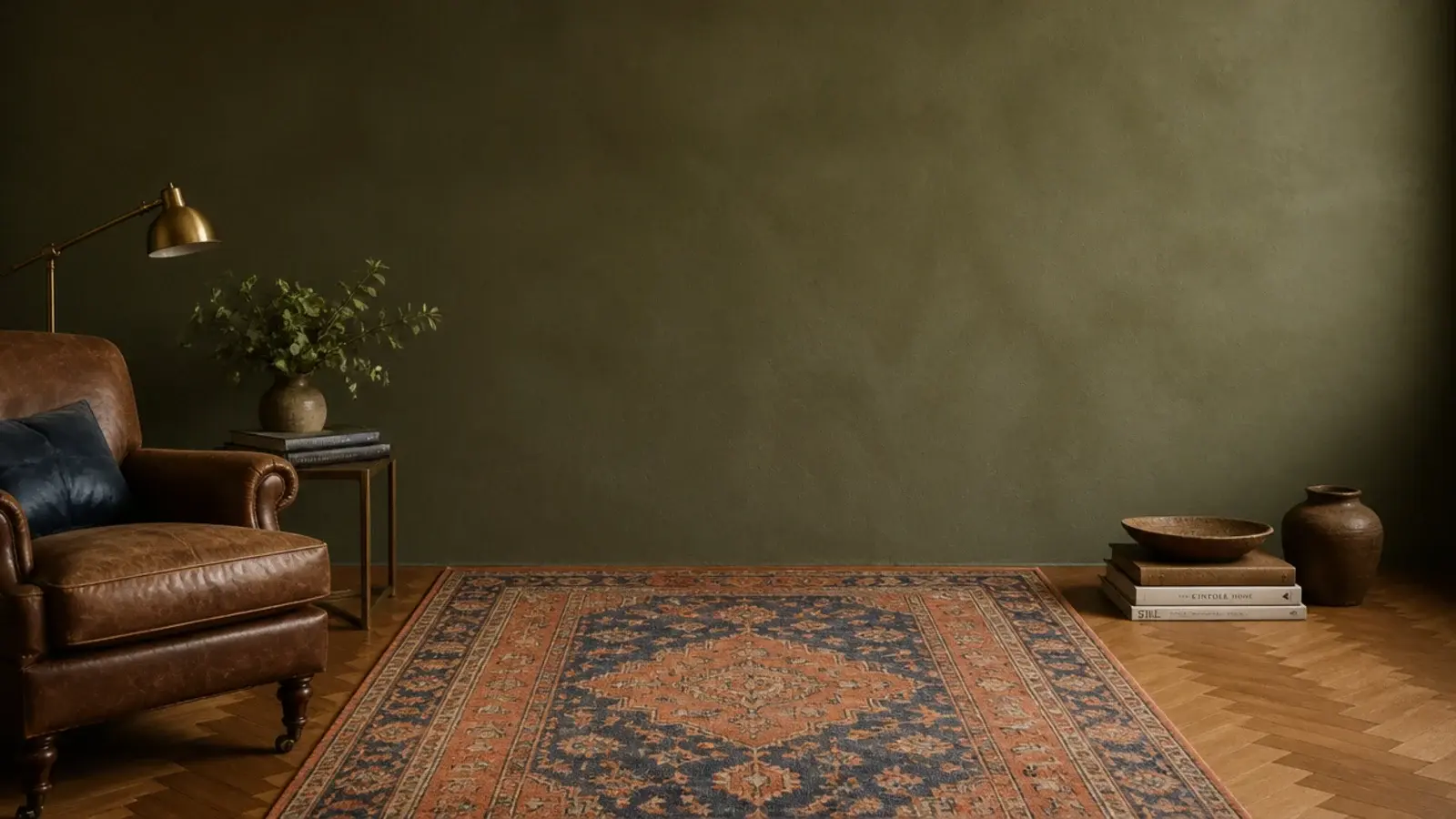 tall view of vintage rugs in a living room over herringbone parquet