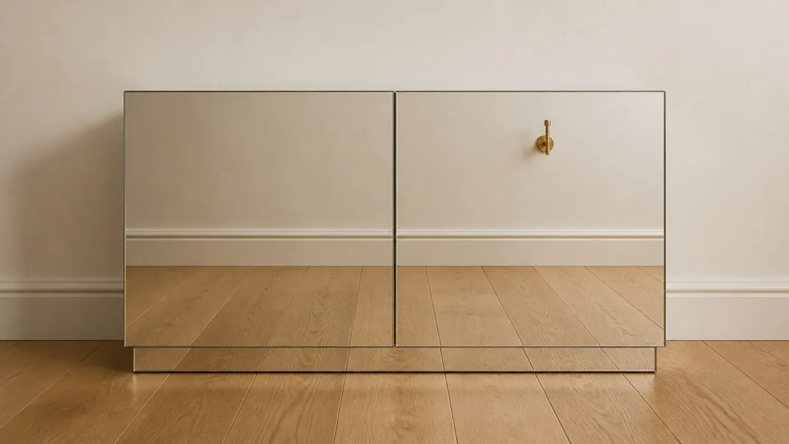 shoe cabinet fully faced in mirror glass from plinth to top edge