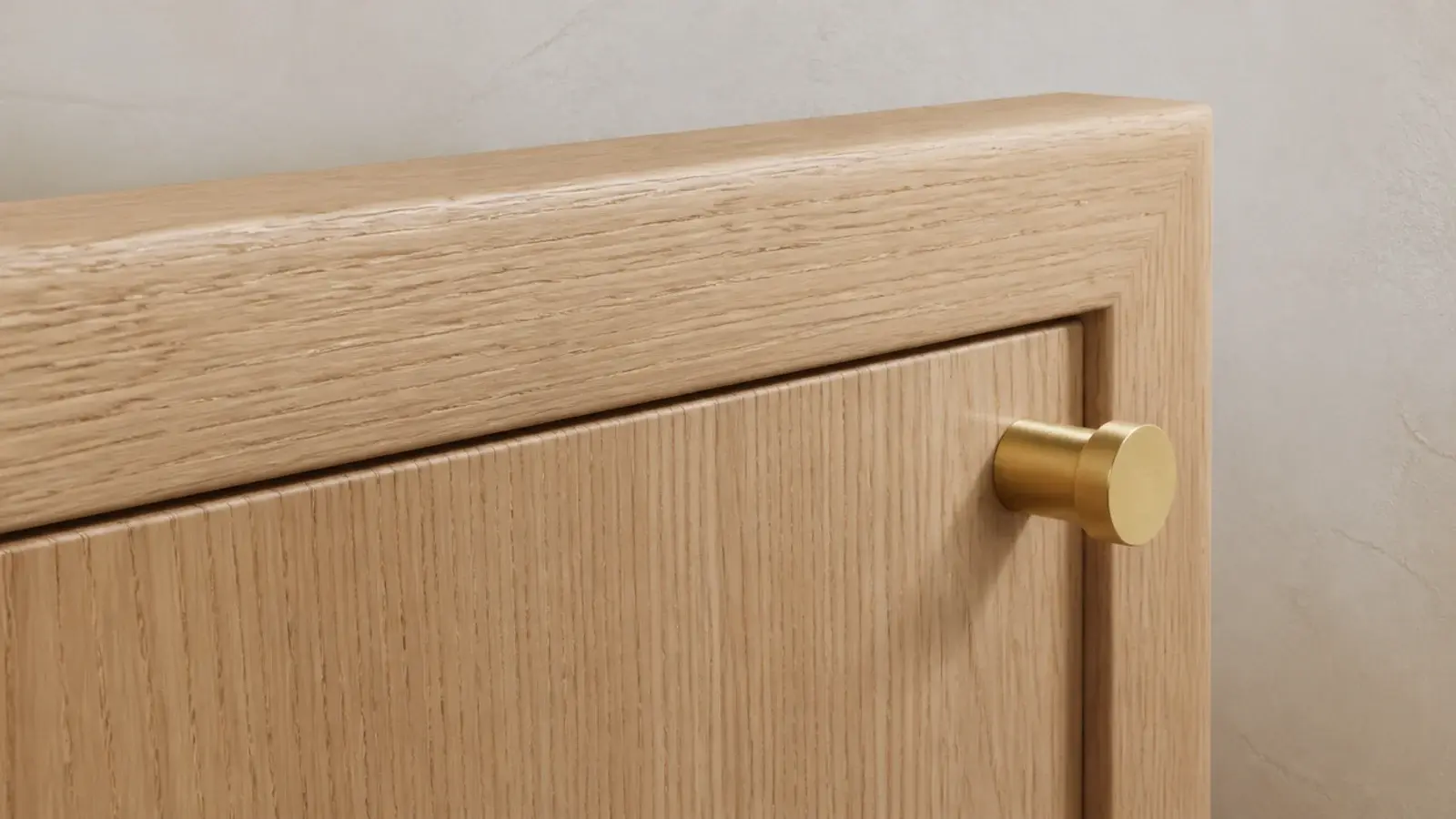 solid oak shoe cabinet door showing dense grain and a softened edge