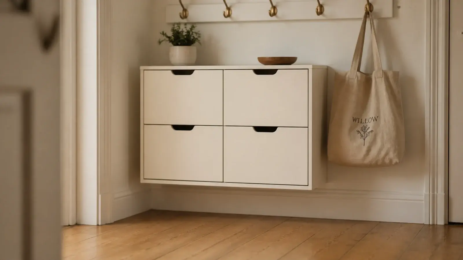 wall hung shoe cabinet floating above a clear entryway floor