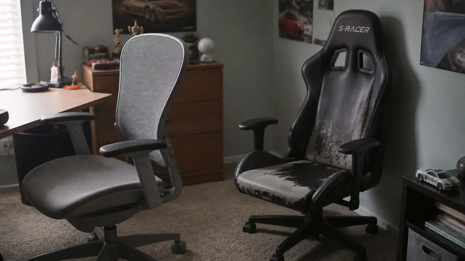 mesh task chair beside a discarded racing style gaming chair