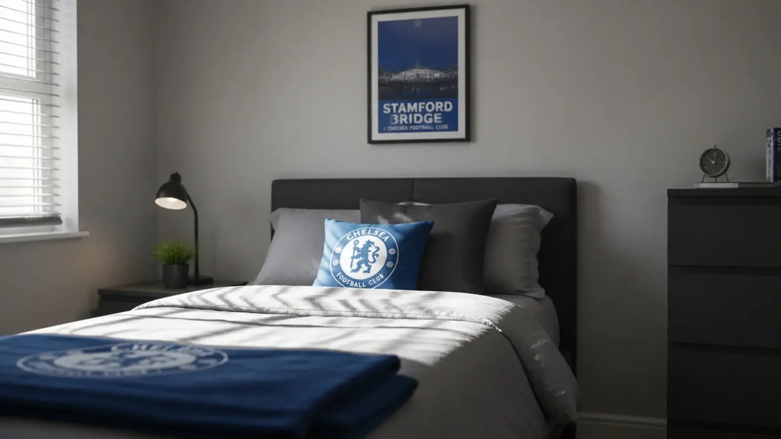 neutral bedroom with team colours appearing only in bedding and prints