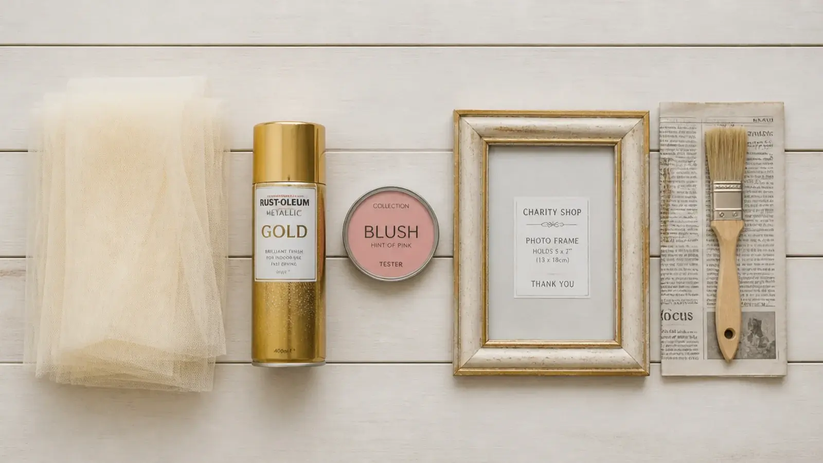 flat lay of tulle gold spray paint and a blush tester pot