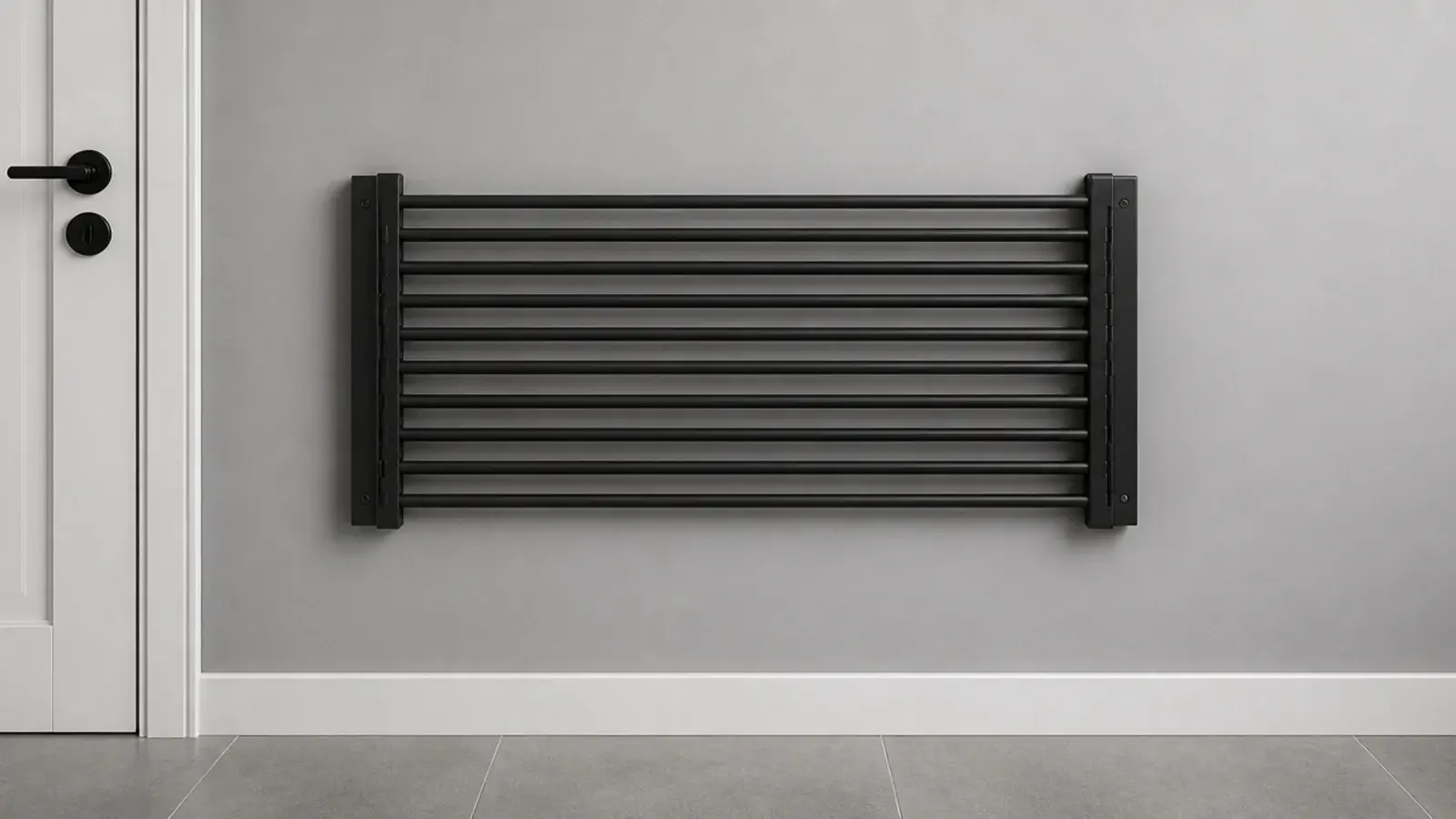 concertina wall drying rack folded flat against a painted utility wall