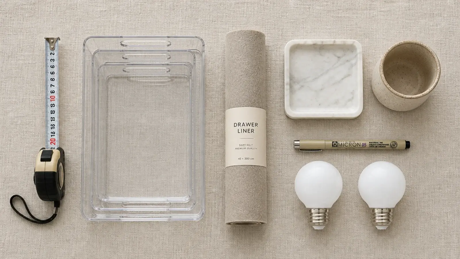 flat lay of tools and inserts gathered for a vanity organization project