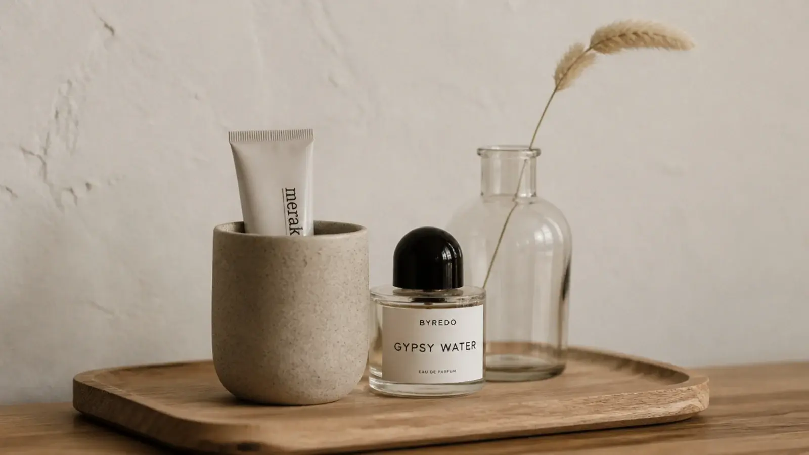 vanity styled in oak and stoneware with clear glass bottles only